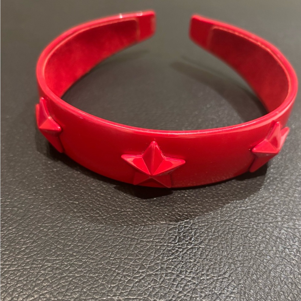 Marc Jacobs red lined plastic headband with star embellishments